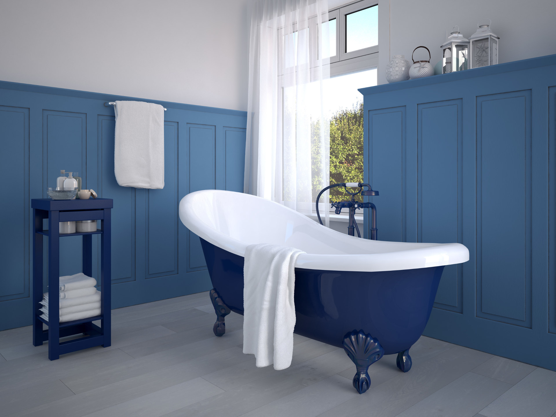 Niebieski w mieszkaniu, stylowa wanna wolnostojąca, niebieska sztukateria, drewniana podłoga, niebieski stolik pomocniczy