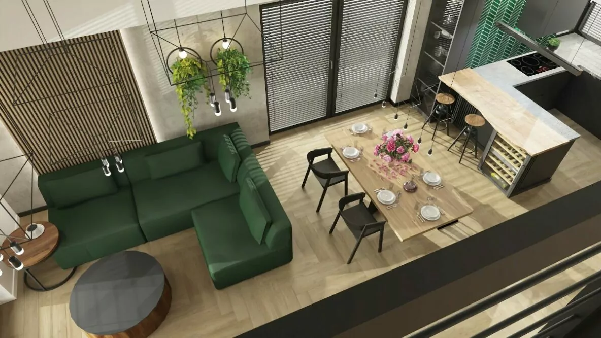 Projekt mieszkania cena, salon połączony z kuchnią i jadalnią, widok z góry z antresoli, zielona kanapa, drewniany stół czarne drewniane stołki przy stole, kuchnia z drewnianym barkiem blatem