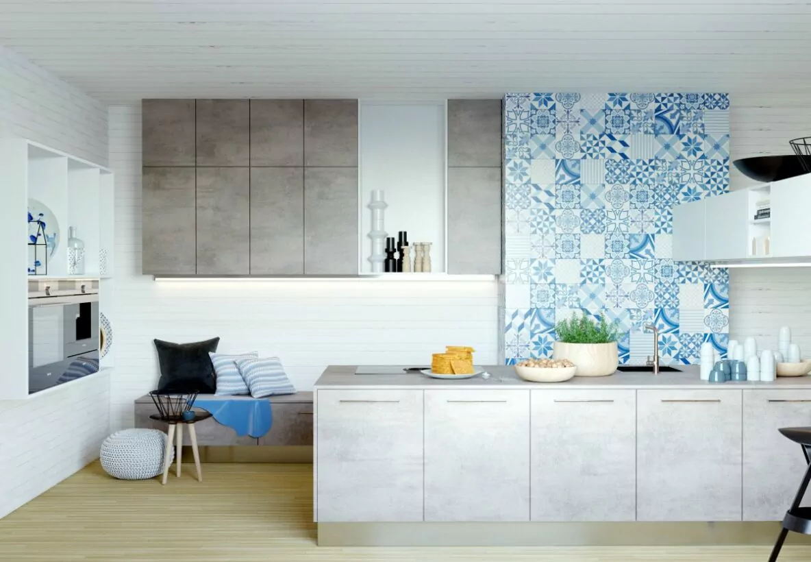 Dlaczego projektant wnętrz, pomieszczenie kuchenne szafki kuchenne imitacja betonu, szare szafki kuchenne, kafelki we niebieskie portugalskie wzory, kafelki w marokańskie wzory, siedzisko w kuchni 