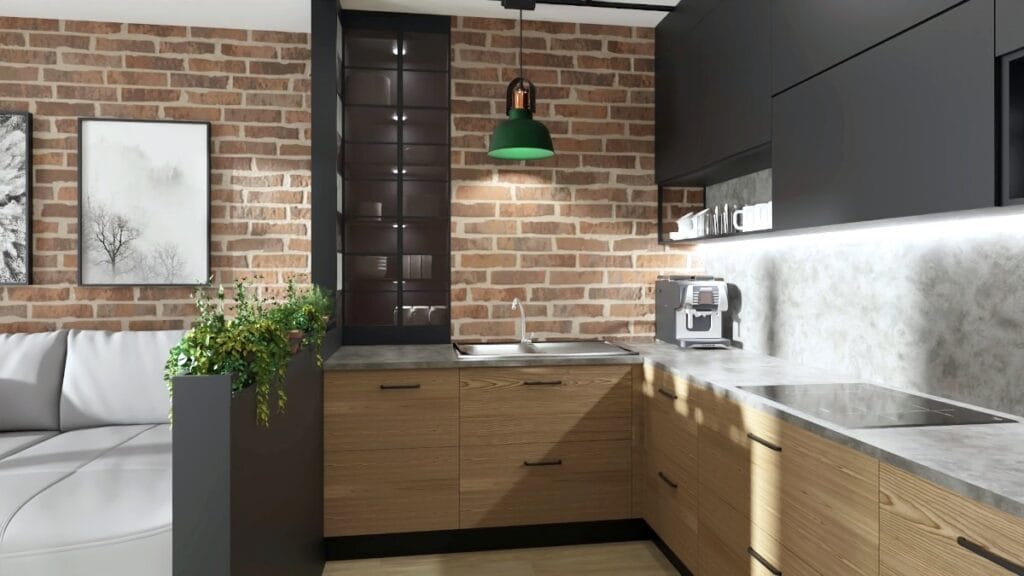 Remont-kawalerki-machinasnu.pl Małe mieszkanie projekt, kuchnia w kawalerce, kuchenne dolne szafli drewniane, górne szafki w kuchni grafitowe, kuchnia płyta Swiss Krono, zielona metalowa lampa nad blatem, szklana witryna we wnęce